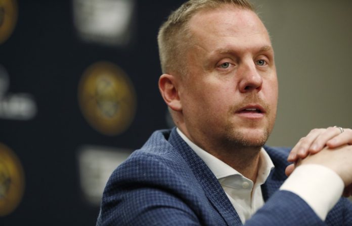 FILE - Denver Nuggets president of basketball operations Tim Connelly considers a question during a news conference on May 21, 2019, in Denver. A pers...